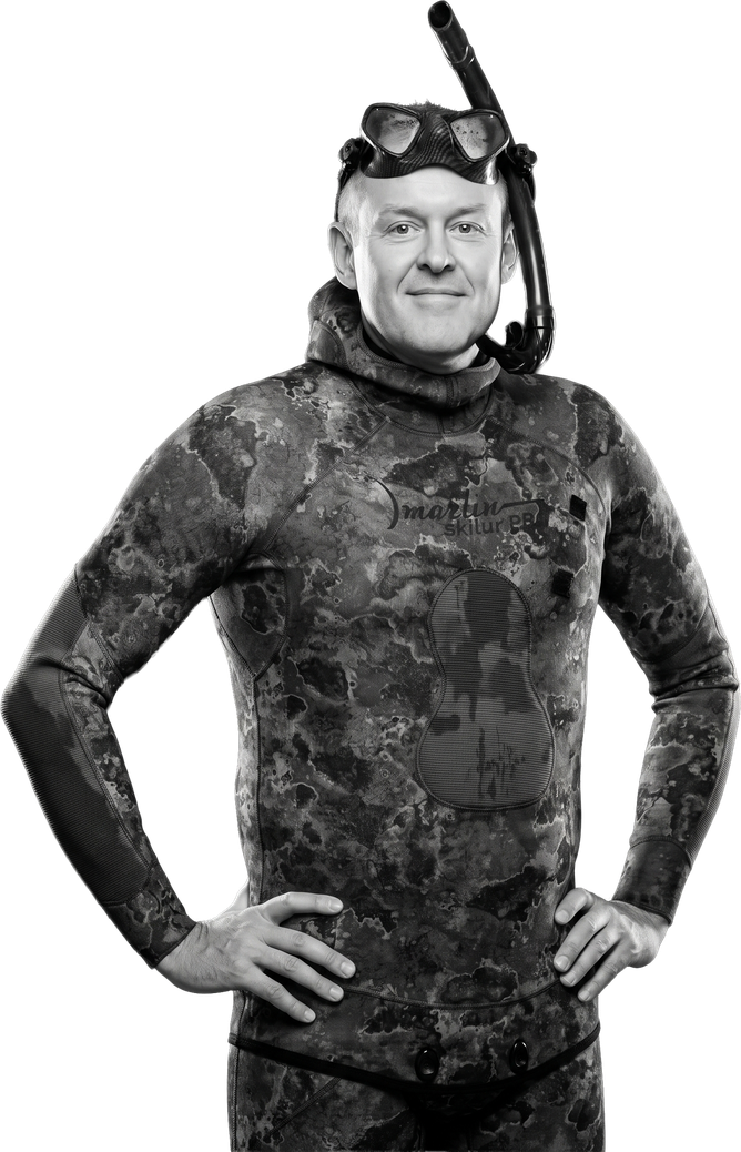 Oleg Zybailov in a wetsuit and dive mask